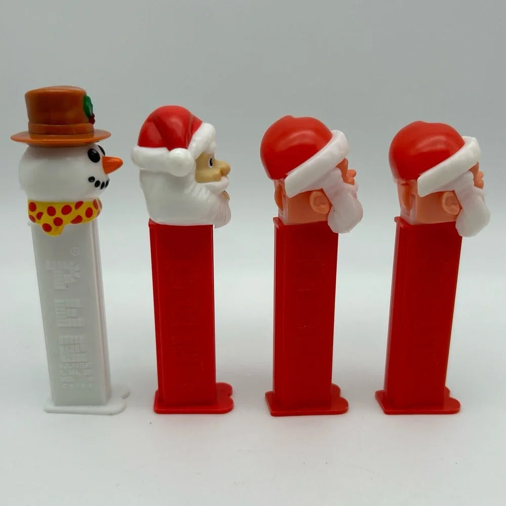 Lot Of 4 Vintage PEZ  Candy Dispensers Santa Clause And Snowman